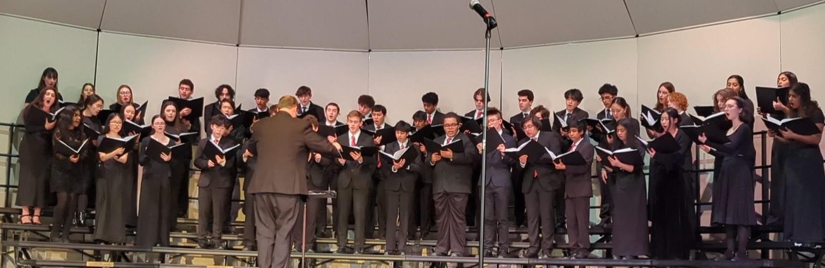 Lexington Honors Chorus Learns the Real Version of “The Joke” The